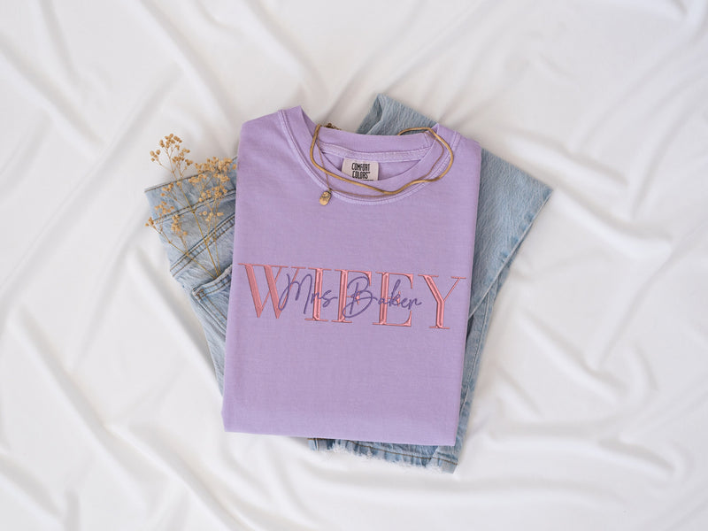 a purple shirt that says wibbly on it