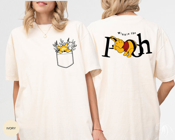 a woman wearing a winnie the pooh t - shirt