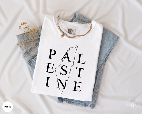 a t - shirt that says pal est line next to a pair of jeans