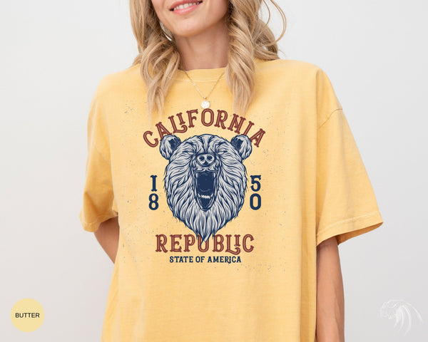 a woman wearing a yellow california bear t - shirt