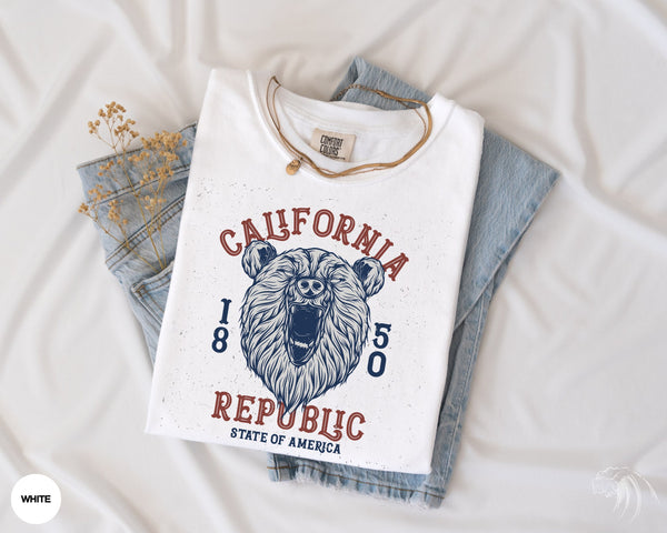 a white t - shirt with a grizzly bear on it